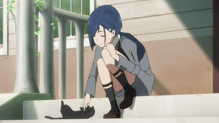 The character Ichigo from Darling in the FRANXX playing with a black cat